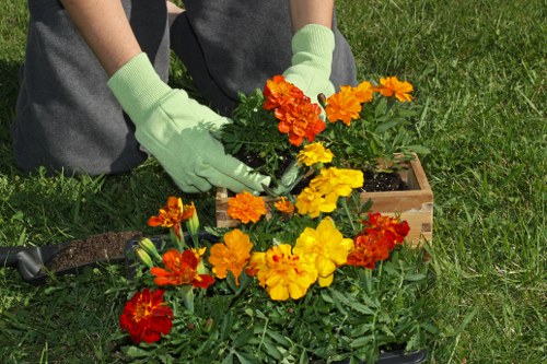 First aid kit and safety equipment at a gardening worksite